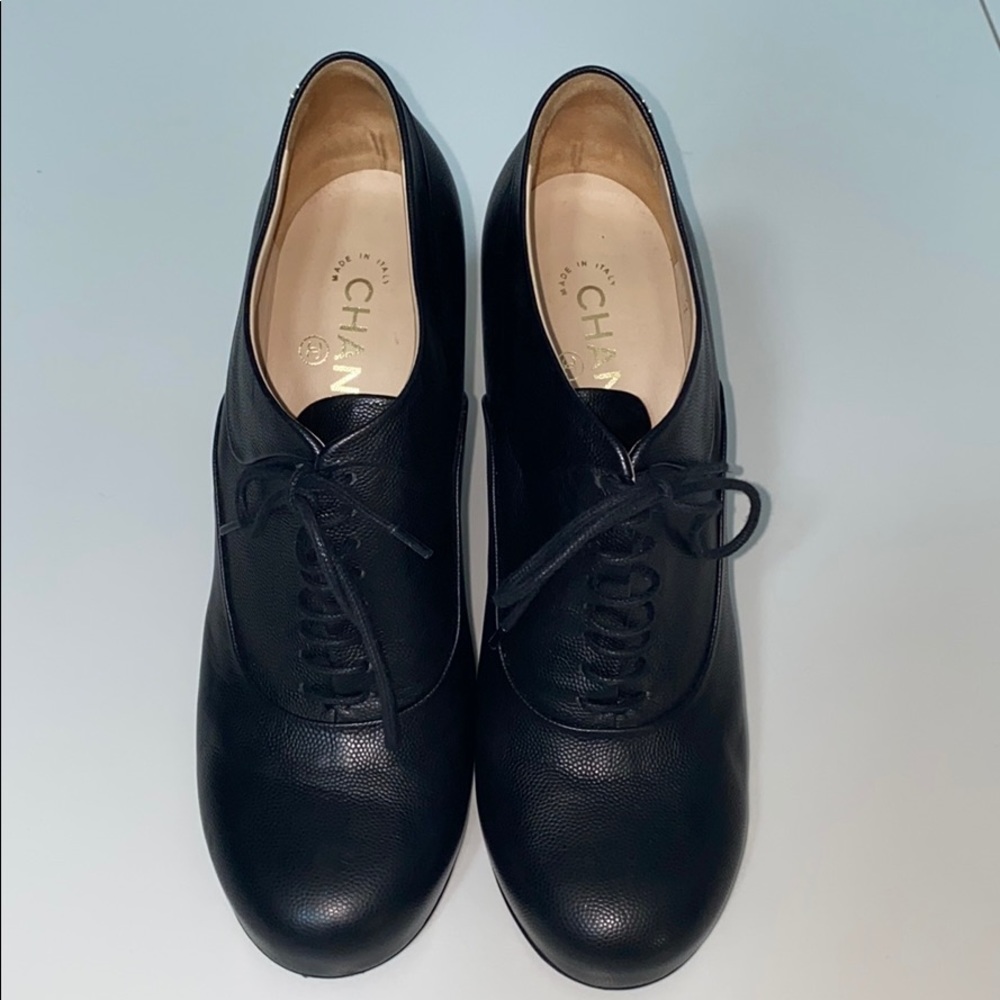 CHANEL lace up calfskin boots
